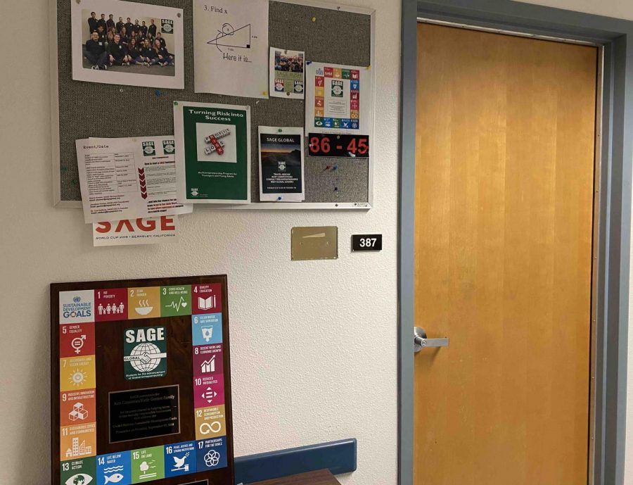 Curtis DeBergs office door in Tehama Hall is left blank next to SAGE Global memorabilia. A plaque in honor of Sierra Nevada Brewing Company founder Ken Grossman is visible. It reads SAGE commends the Ken Grossman/Katie Gonser Family for its commitment to helping teens create socially responsible businesses that address the United Nations Sustainable Development Goals.