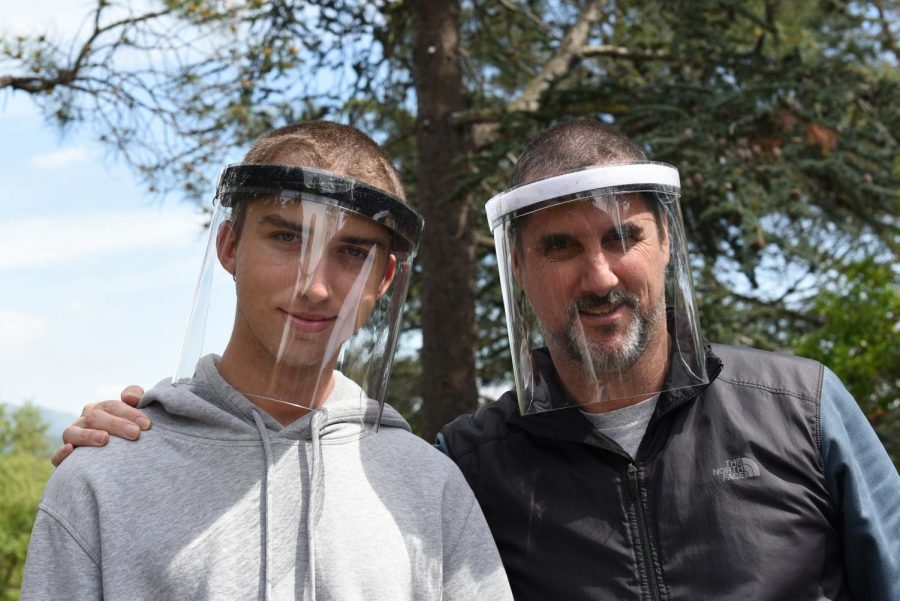 Griffin Wooldridge and Mike Wooldridge wearing their Open Source Shield face shields. Photo by Linda Wooldridge