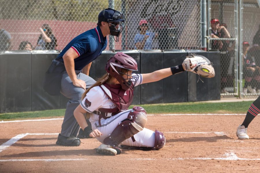 #15 Sara Mitrano catches a pitch in a game at Chico State