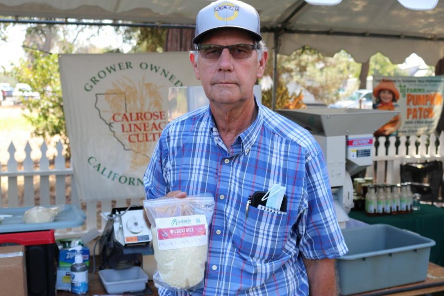 Randall Mattson, Co-owner of Richvale Natural Foods, stands at his booth for a picture. Mattson is a donor to the Hungry Wildcat Food Pantry. Photo by Noah Herbst, taken Sept. 25