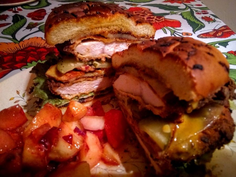 Honey mustard, bacon, pickle and provalone crispy chicken sandwich with fruit salad. Photo by Ian Hilton, 9/8/2021.
