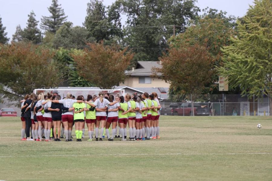 Wildcats huddling up in a match earlier this season.