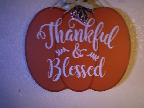 Pumpkin saying "Thankful and Blessed."
