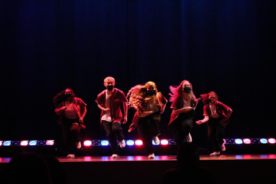 Envy getting into it while performing their choreography.