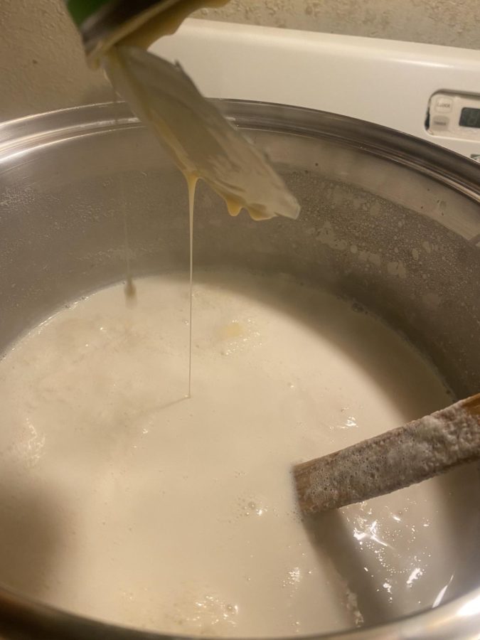Adding sweetened condensed milk during the process. 