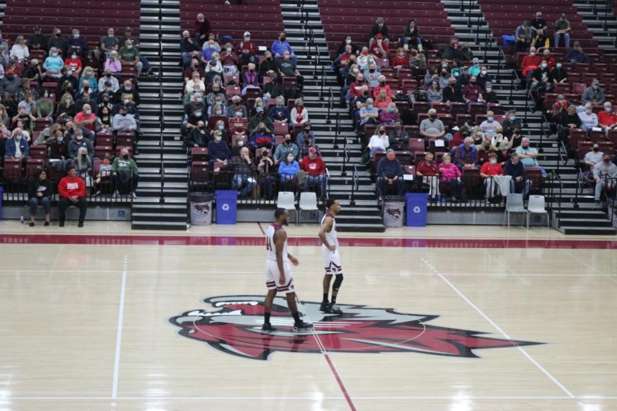 Forward Kelvin Wright Jr. and guard Kevin Warren at half court during their game against the Jacks.