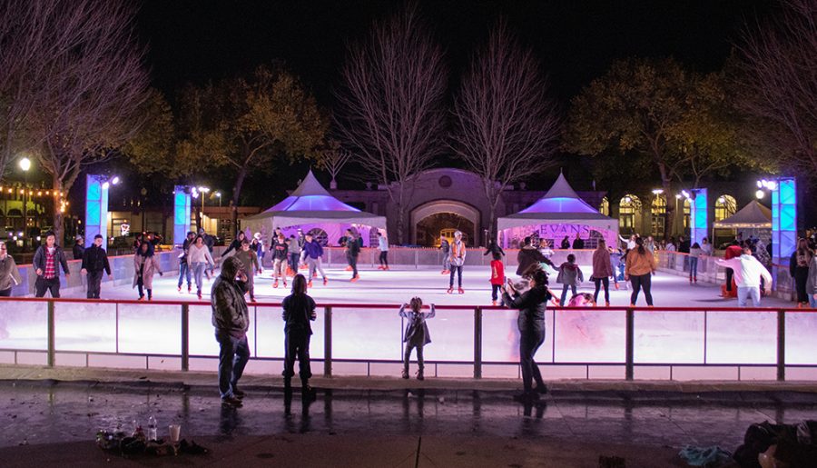 People ice skating at the grand opening of the Chico Ice Rink in the Plaza.