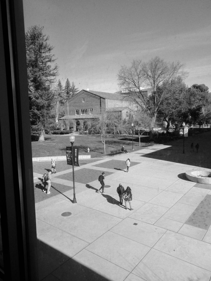 Chico State students walking toward the Arts and Humanities building. Photo taken by Jolie Asuncion on February 2, 2022.