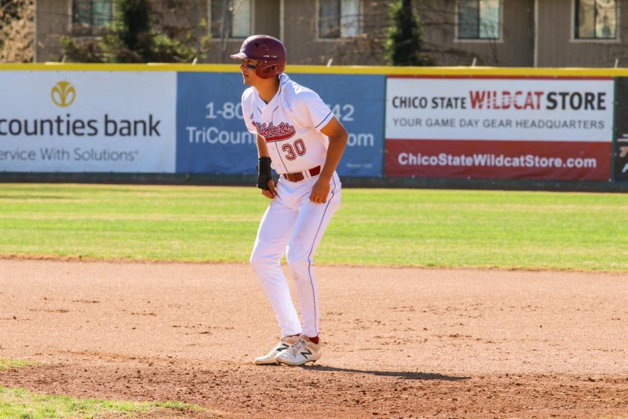 At first base, junior Andrew Crane is waiting for an opportunity to advance to second base.