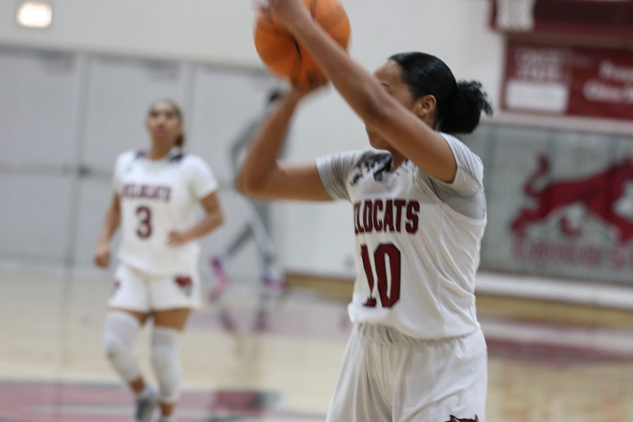 Wildcat India Starr shooting a 3-pointer against the Pioneers on Feb. 26