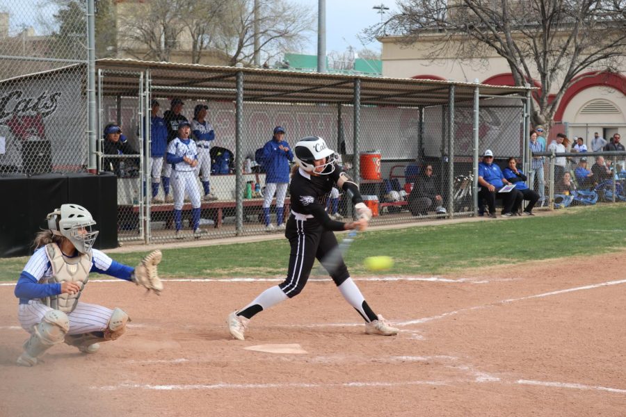 Freshman third baseman and first baseman Grace Stover putting the ball in the play.