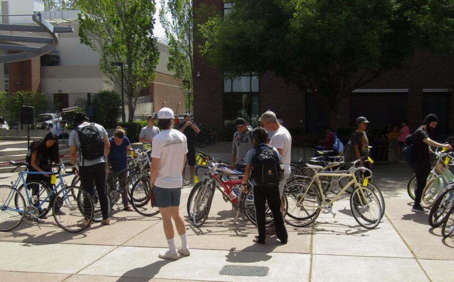 Students and Community members check out the Spring 2022 Bike Auction on April, 8, in front of the Student Services Center.