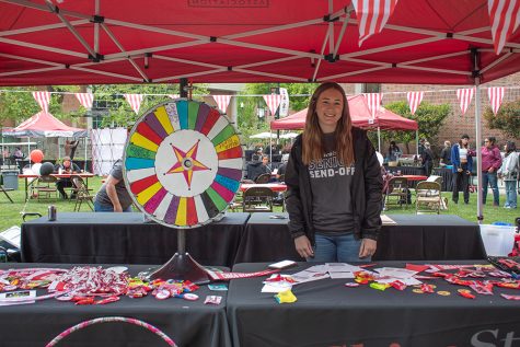 Seniors were invited to spin the wheel for prizes at one of many booths at the Senior Send-off. The event was hosted on Chico State campus to celebrate the graduating class of 2022 with fun games, free food and live music. Photo taken by Ava Norgrove on April 19.