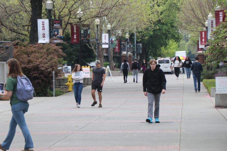 Students walking through campus by the Bell Memorial Union on March 30. 