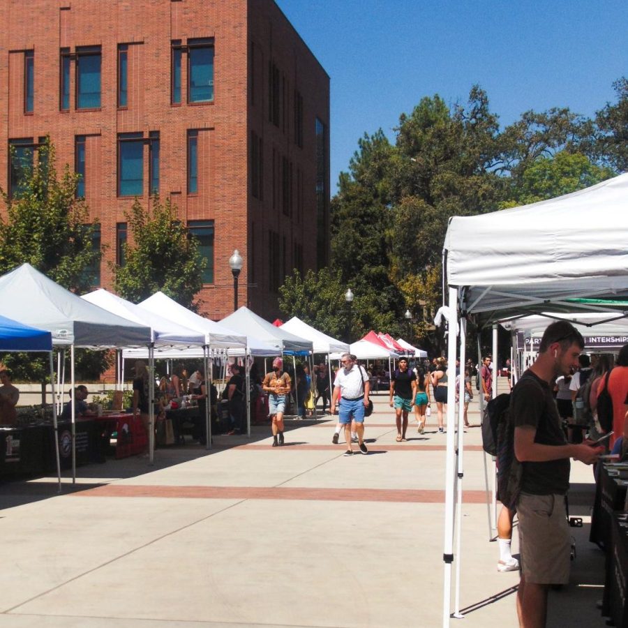 Chico State clubs lined up near the science building. Photo by Jolie Asuncion on Aug. 24, 2022.