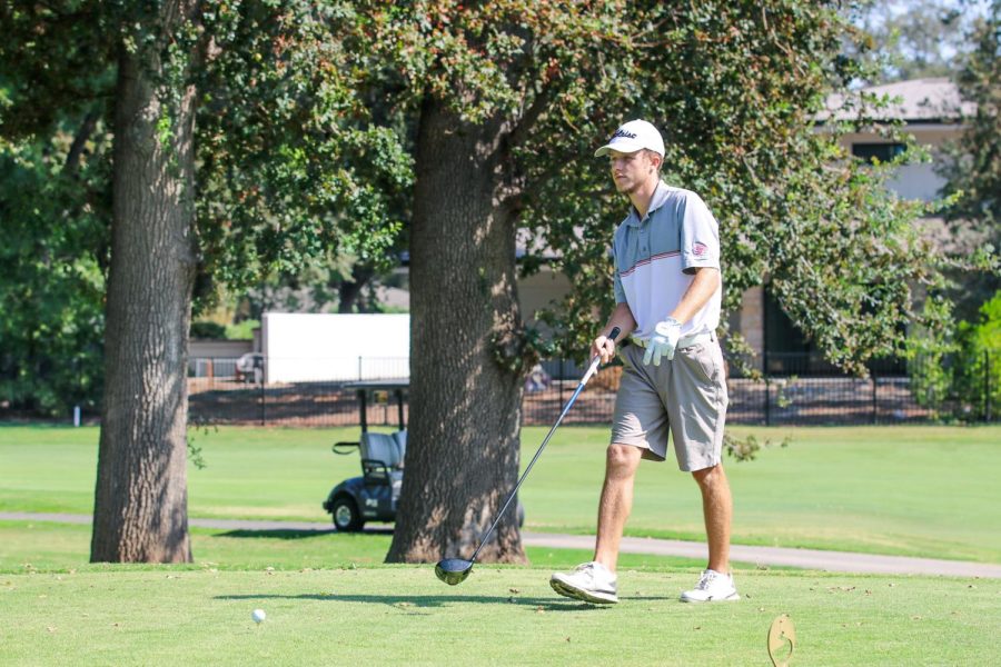 On+Sep.+14%2C+sophomore+Brayden+Russo+is+walking+up+to+the+tee+box+and+looks+to+hit+the+golf+ball+down+the+fairway+with+his+driver+at+the+Butte+Creek+Country+Club+in+Chico.