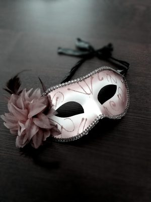 Photo by Ibolya Toldi: https://www.pexels.com/photo/carnival-mask-decorated-with-pink-flower-3836671/