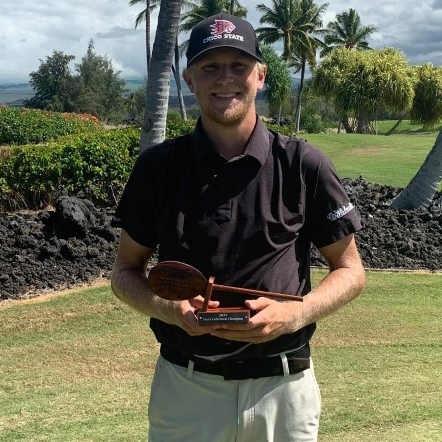 At the Hawaii Pacific Shark Shootout, junior Tyler Ashman holds his individual championship trophy. For Ashman, this was his first tournament win.