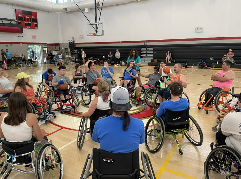 Ability First attendees at a wheelchair basketball event