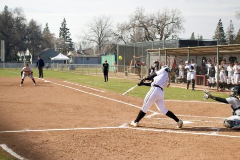 Grace Gallagher hitting at home base.
Taken Feb. 10th