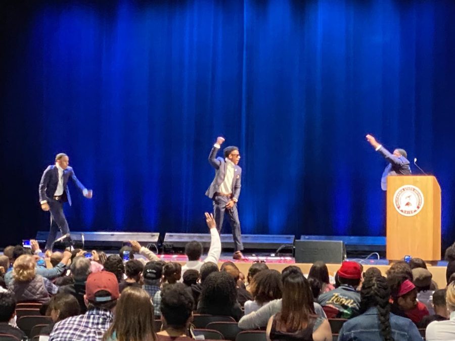 Fraternity Kappa Alpha Psi performs a dance routine on stage.