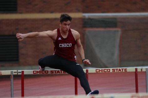 Chico athlete competes in the hurdles.