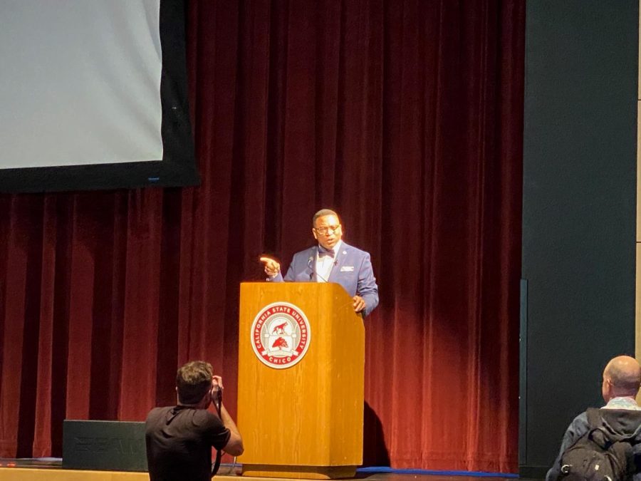 Keynote speaker Hardy Brown gives speech on stage.