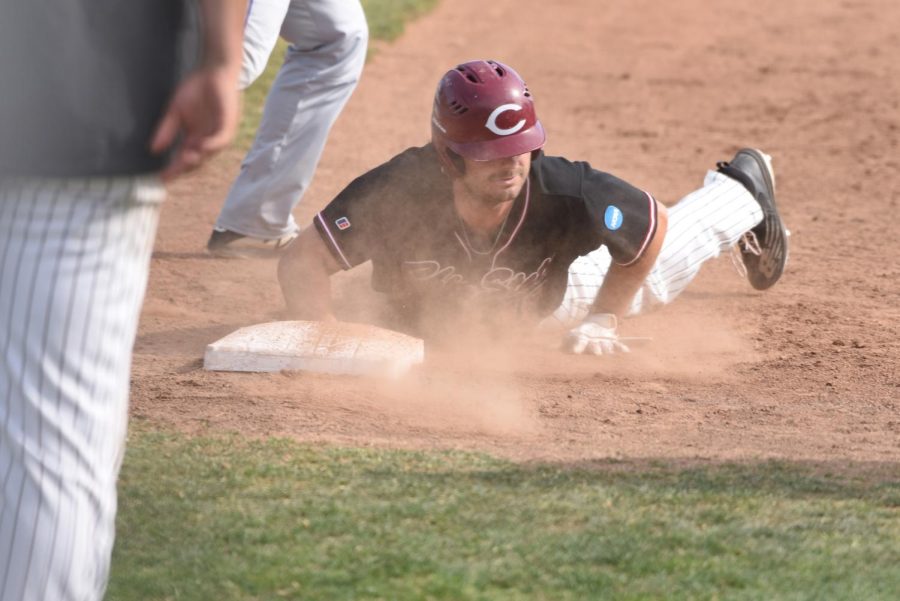 Kyle Dobson sliding, photo courtesy of Chico State Athletics.