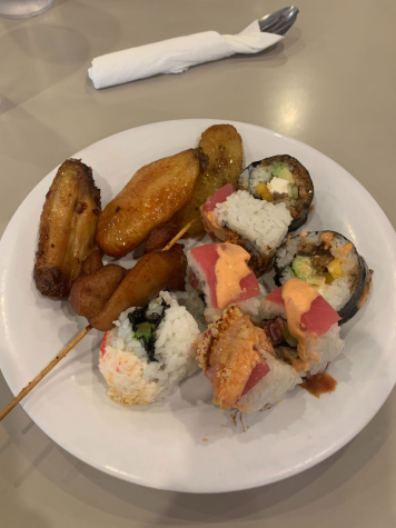 White plate filled with plantains, sushi and chicken