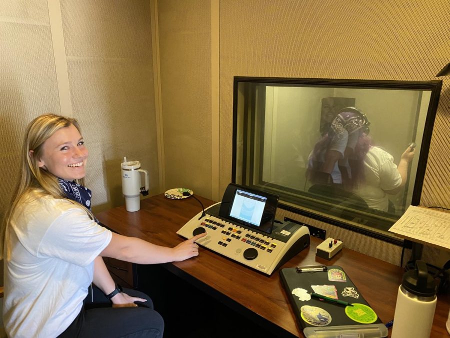 Chico State speech pathology Master's student demonstrates a screening offered at the on-campus clinic.