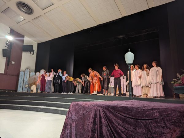  The cast of “Dr. Faustus” takes a triumphant bow after their first performance.