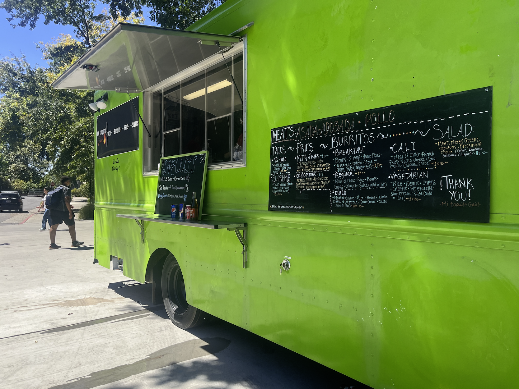 bright green mi taquito grill food truck