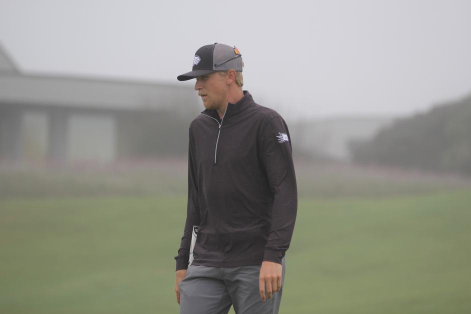 Senior golfer, Tyler Ashman on the foggy golf course in Bodega Bay. 