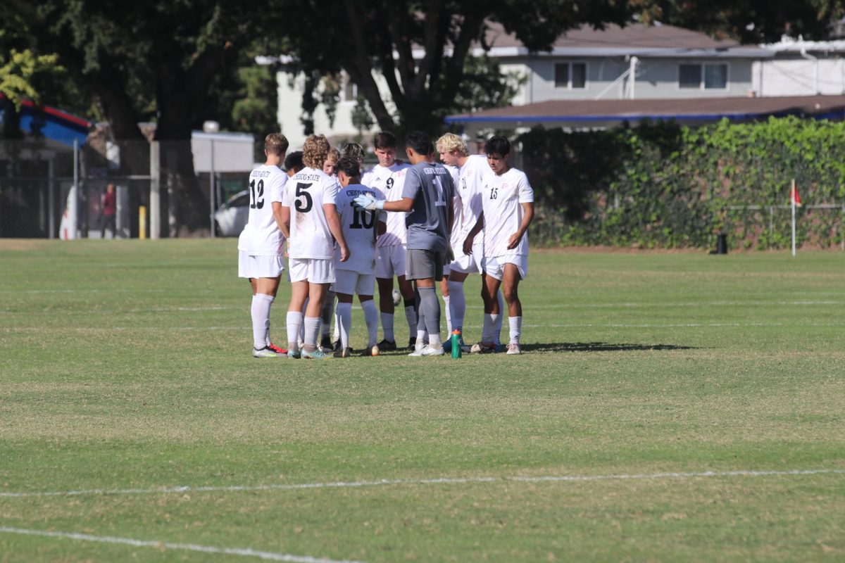 On Oct. 15, the Chico State Mens Soccer team huddles up before playing their match against the Humboldt Lumberjacks.