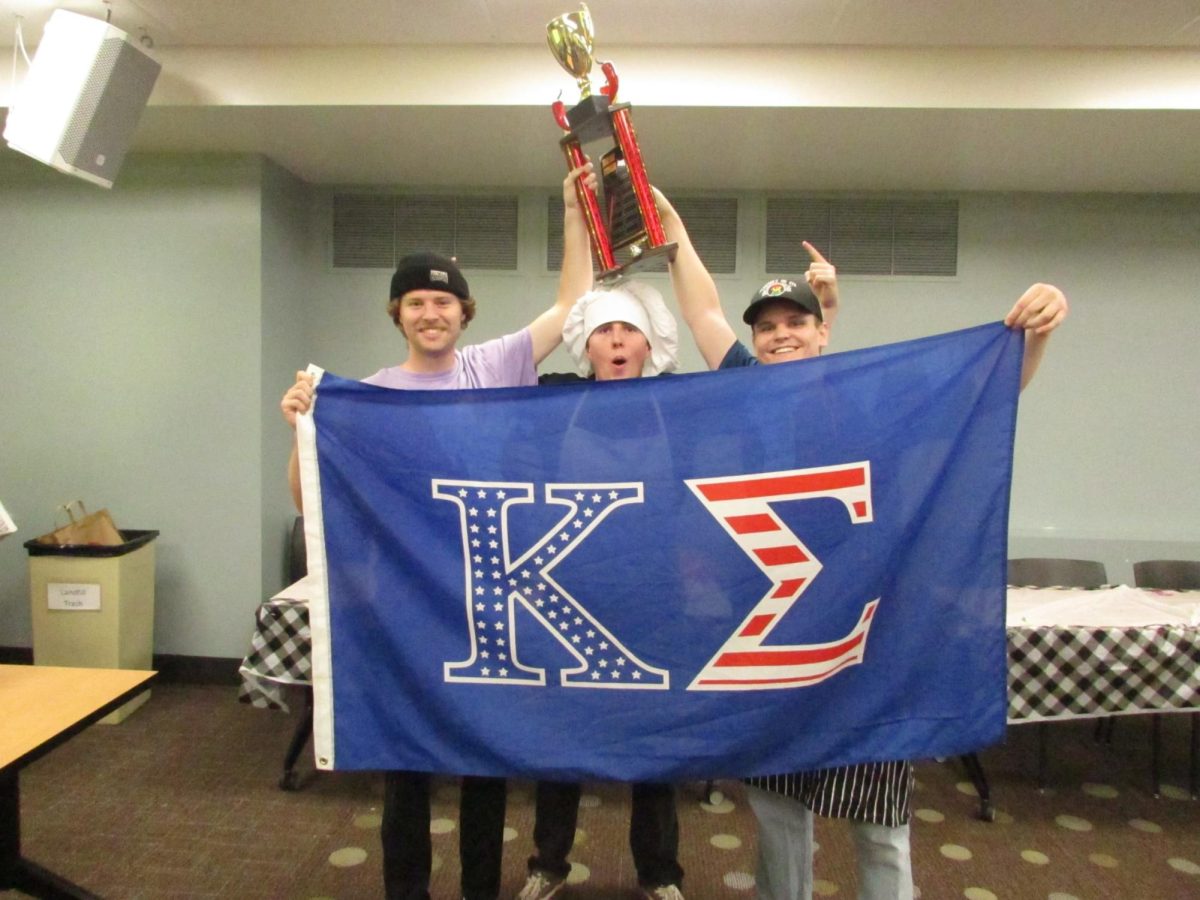 Members of Kappa Sigma, Aiden Paul, Van Clow and Ronnie Vicari pose with the Chili Cook Off trophy. Taken by Natalia Cortez-Pagan on Oct. 25.