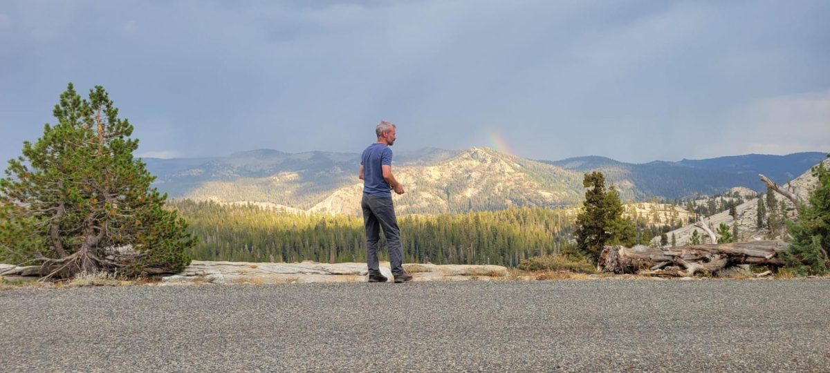 Nate Farrington stares off at a mountain scape. Courtesy: Nate Farrington