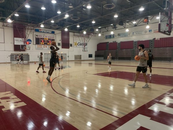 Chico State putting up shots before practice. Taken by Nathan Chiochios on March 12.