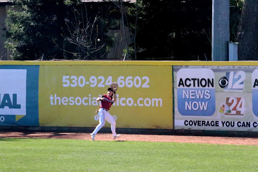 Right fielder Troy Kent making a play on a deep fly ball in the top of the sixth against San Marcos. Taken by Nathan Chiochios on March 17.
