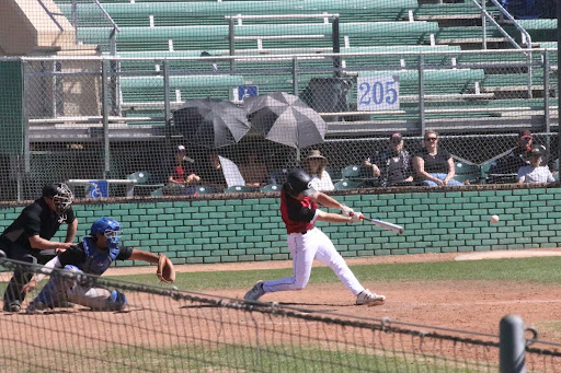 Junior Stefan Foley hitting a tie-breaking double to left field. Taken by Nathan Chiochios on March 17.
