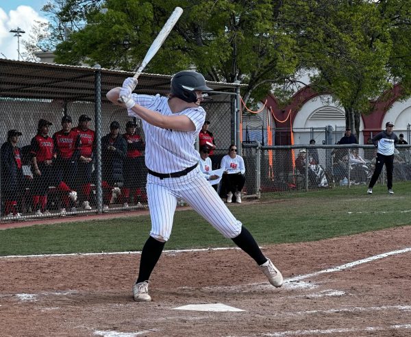 Chico State sophomore Destiny Sevilla at the plate against the Cal State East Bay Pioneers in game one of Friday’s doubleheader. Taken by Lukas Mann on April 5.