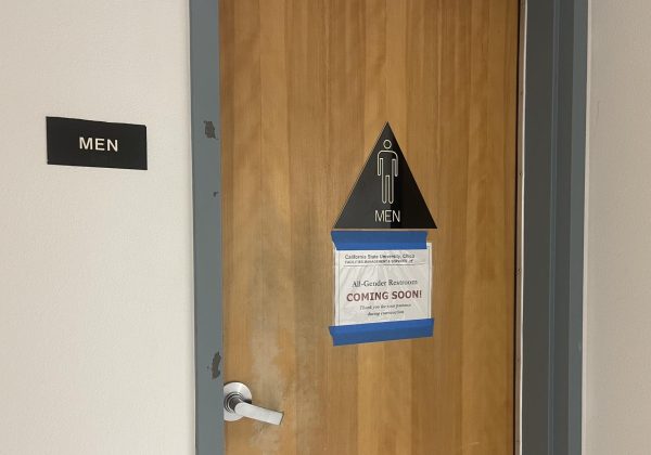 The men’s bathroom on the second floor of Tehama Hall has a sign titled “All-Gender Restroom Coming Soon!” taped to it. The restrooms are expected to be updated by the fall 2025 semester in Yolo and the Student Services Center will also be under construction. Taken by Grace Stark on April 11.