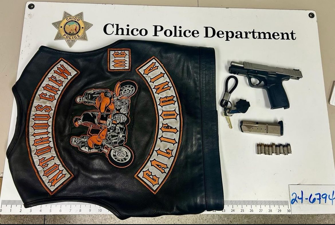 An inventory search of Ames vehicle revealed he was in possession of a loaded firearm inside of a leather motorcycle vest.  Courtesy: Chico Police Department