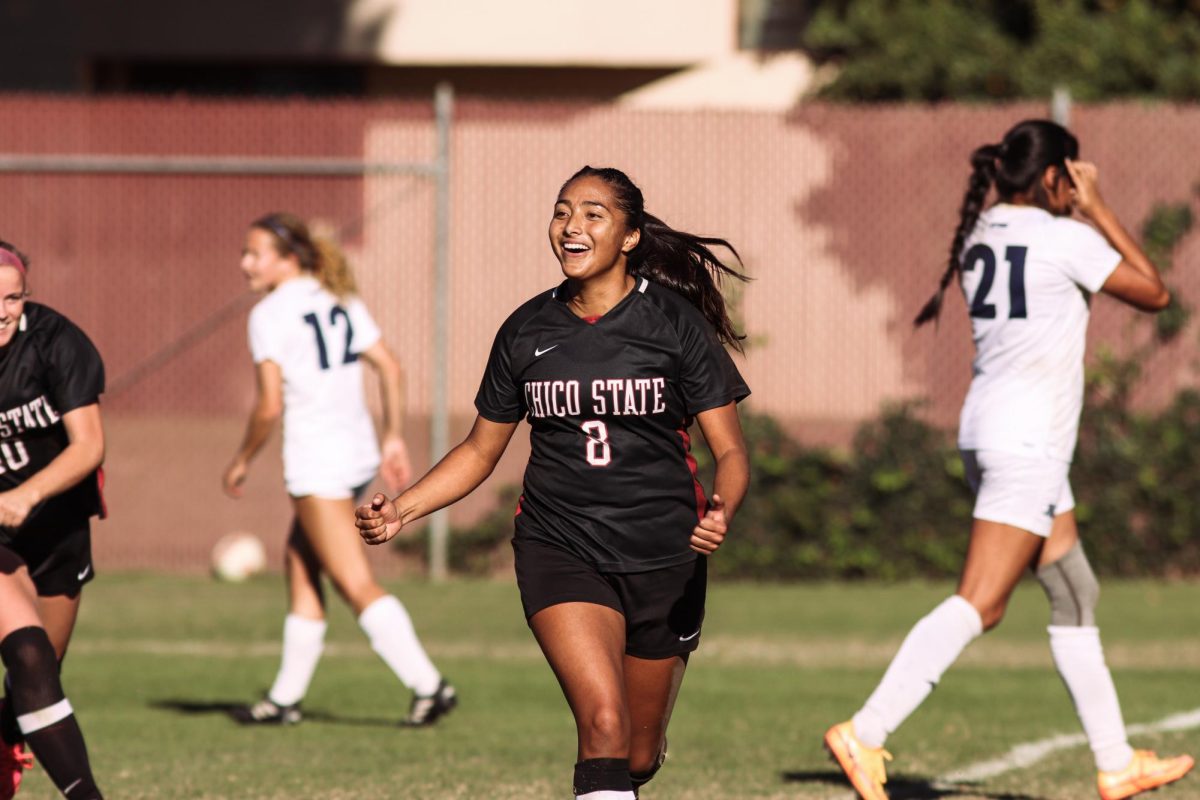 Chico State midfielder Natalie Mendoza — center — after scoring a penalty kick against Cal State Monterey Bay. The goal would be the difference in the game, as the Wildcats won 1-0 over the Sea Otters. Taken by Milca Elvira Chacon on Oct. 29, 2023.