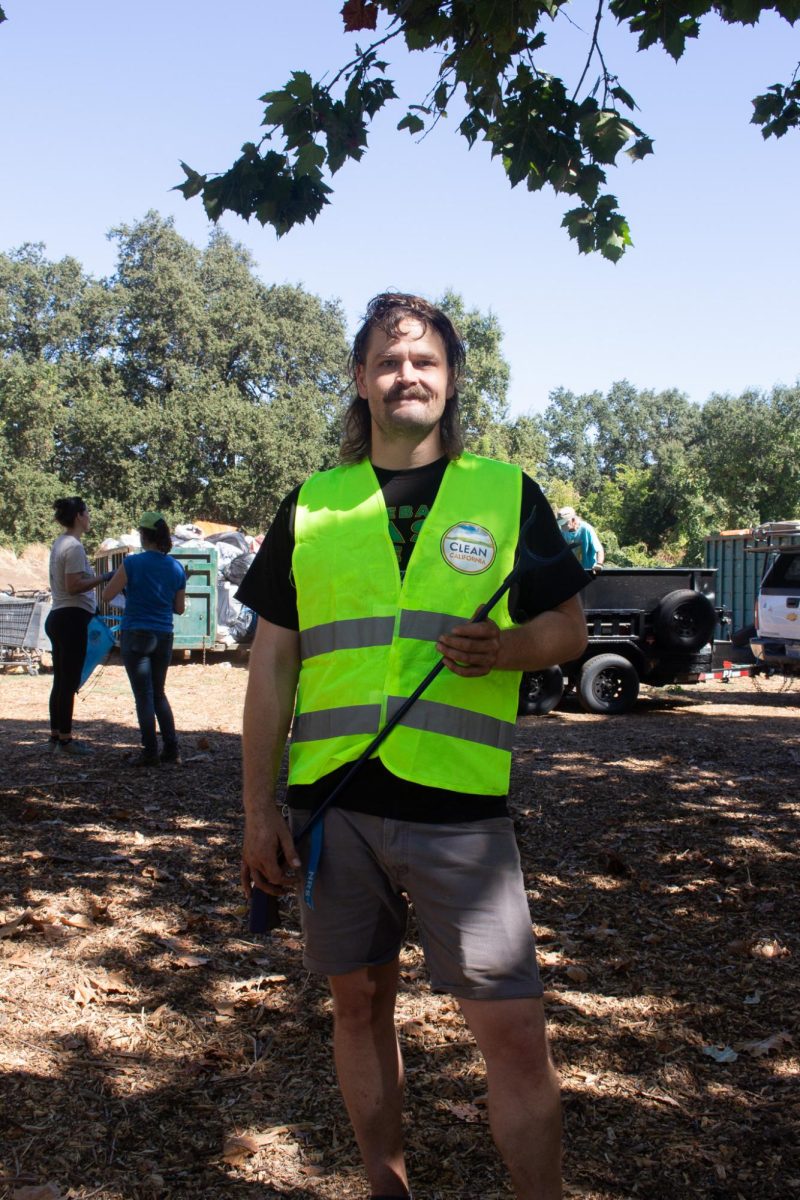 Volunteer Sage Hudson prepped and ready to help clean up the community parks on Sept. 21. Hudson brought out a group of friends and family to help.