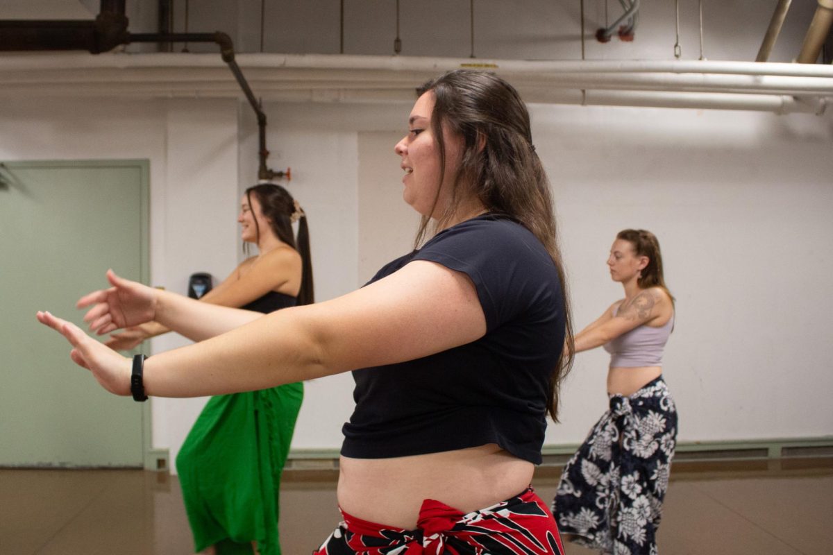 From left, Lehua Roth, Keilani Adams and Elizabeth Thompson practice their new choreography. Throughout the dance they tell a story with each movement, gesture, look and expression.