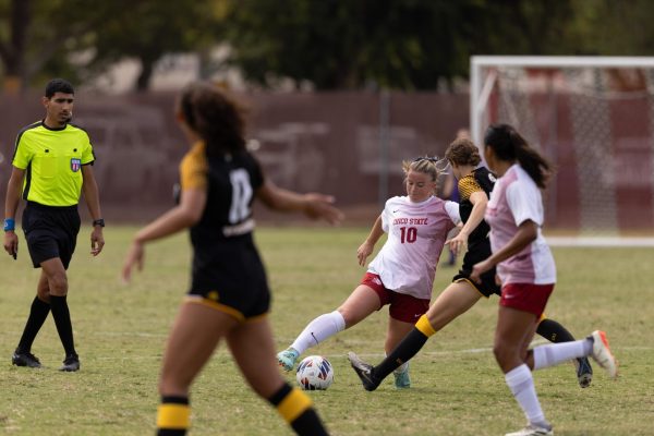 Chico State Wildcats’ #10 Brynn Howard dribbles the ball around the defender in a game against Dominican on Aug. 24 in Chico. Photo Courtesy of Aaron Draper.
