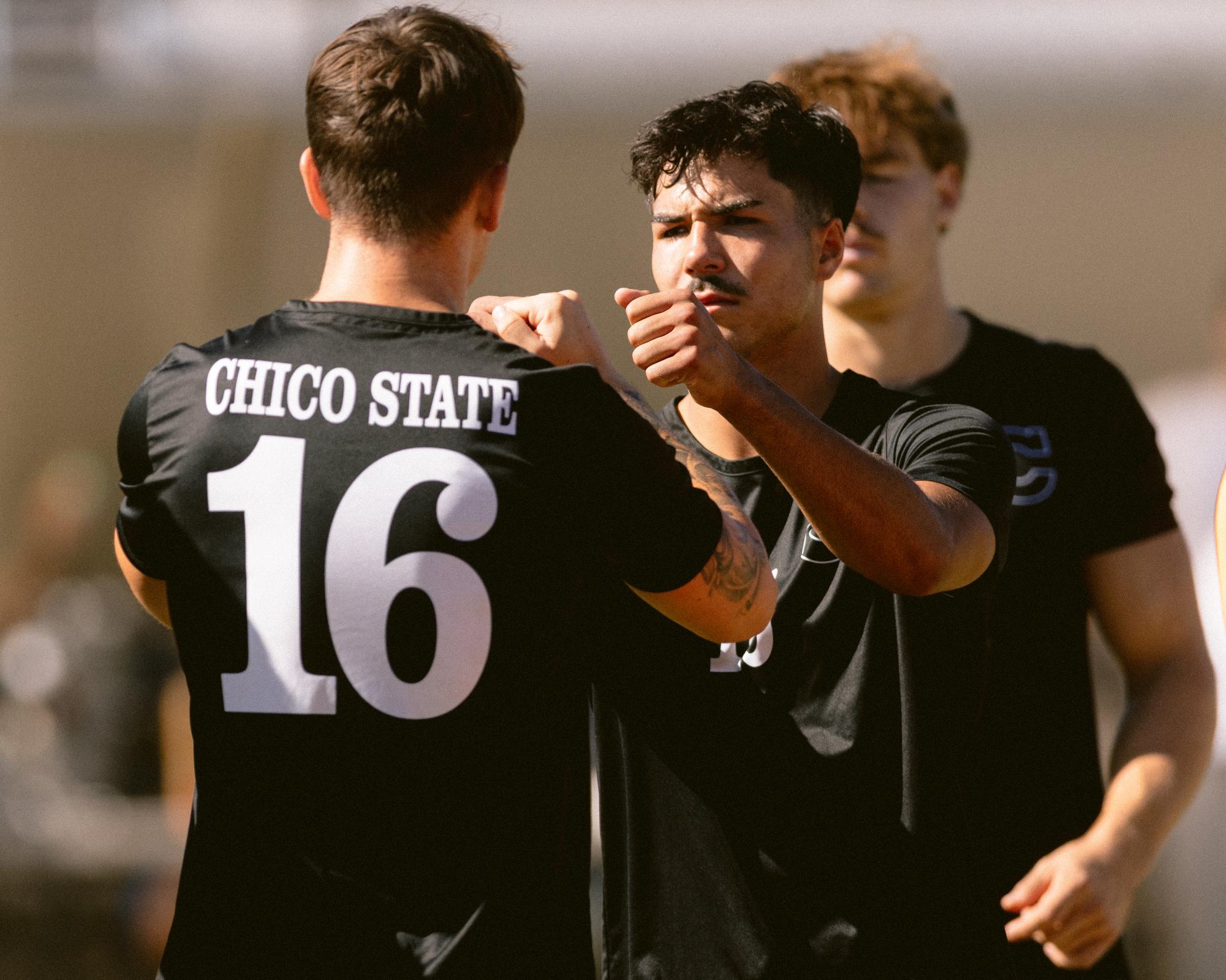 Chico State senior defender Preston Moll fist fist-bumping junior defender Carson Zarate pregame before taking on the Cal State Dominguez Hills Toros on Oct. 6. Photo taken by Aaron Draper.