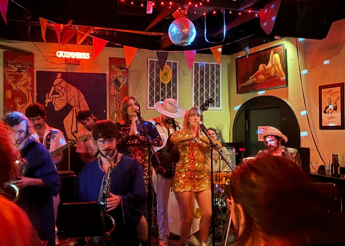 Family Worship Center on stage at Duffy’s Tavern. Nine members of the band gathered to perform to a small crowd from 9-10:30 p.m. The bar was located to the left of the stage with two bartenders working. The back bar was closed off for the night. Photo taken by Sophia MacKinnon on Oct. 6.