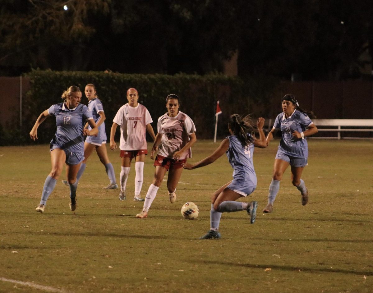 Chico State Wildcats’ #21 Avery Pieri dribbles the ball through the defense in a game against Sonoma State Thursday, Oct. 17 at Chico State. Photo taken by Trevor Lee.
