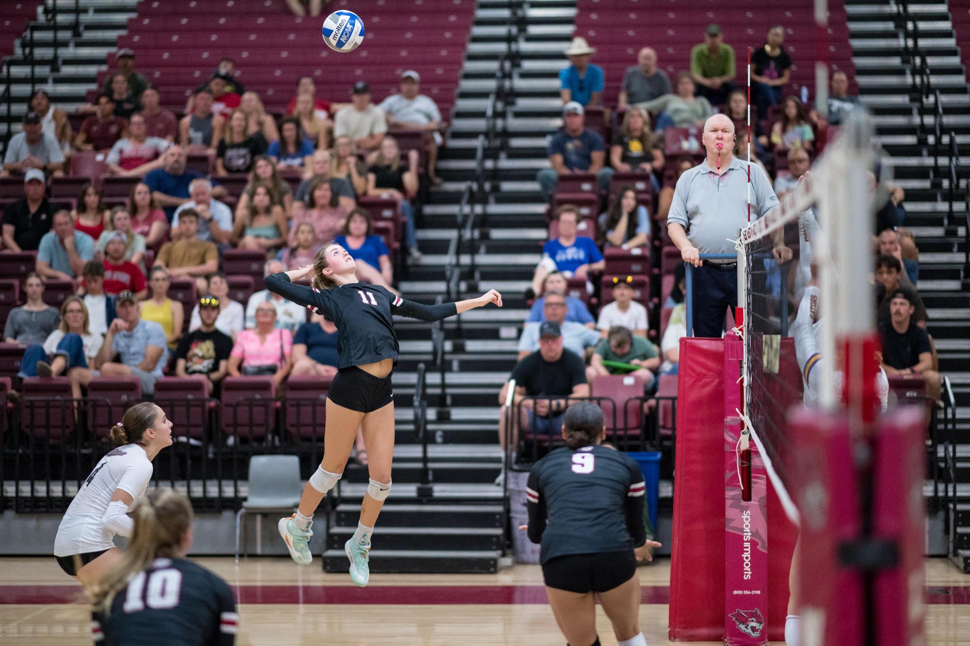 Sophomore outside hitter Maria Wahl attacking the ball against SF State. Taken Oct. 5 by Aaron Draper.